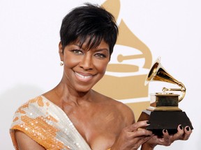 In a Sunday, Feb. 8, 2009 file photo, Natalie Cole holds the best instrumental arrangement accompanying vocalist award backstage at the 51st Annual Grammy Awards, in Los Angeles. Cole’s family said the singer’s cause of her death on Dec. 31, 2015, was idiopathic pulmonary arterial hypertension, which led to heart failure. (AP Photo/Matt Sayles, File)
