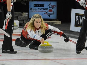 Skip Jennifer Jones shoots the rock during the women's semifinal of the 2016 TSN Pinty's All-Star Curling Skins Game at the Fenlands Recreation Centre in Banff, Alta., on Saturday, Jan. 9, 2016. (Daniel Katz/ Crag & Canyon/ Postmedia Network)