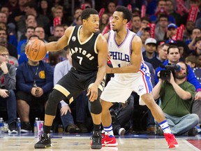 Toronto Raptors guard Kyle Lowry (7) dribbles against Philadelphia 76ers guard Ish Smith (1) during the second half at Wells Fargo Center on Saturday, January 9, 2016. The Raptors won 108-95. (Bill Streicher/USA TODAY Sports)
