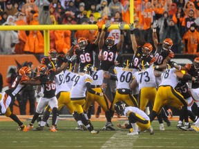 Pittsburgh Steelers kicker Chris Boswell (9) kicks the game winning field goal during the fourth quarter against the Cincinnati Bengals in the AFC wild-card playoff football game at Paul Brown Stadium in Cincinnati on Saturday, January 9, 2016. (Christopher Hanewinckel/USA TODAY Sports)