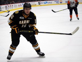 Davis Brown, pictured here playing against the Flint Firebirds on Saturday, Dec. 11, 2016 in Flint, Mich., was released by the Sarnia Sting Friday. This was Brown's final game as a Sting as he suffered a concussion and hadn't played since. Terry Bridge/Sarnia Observer/Postmedia Network