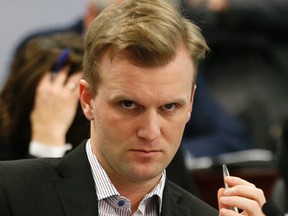 Rookie city Councillor Joe Cressy listens at the start of the budget committee Dec. 15, 2015. (Michael Peake/Toronto Sun)