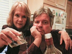 Rick Crumpton and wife Marilyn are not impressed with the bottle of vodka they bought at an LBCO that is was full of water. (Dave Thomas/Toronto Sun)