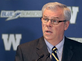 Premier Greg Selinger takes part in a news conference held by the Winnipeg Blue Bombers in 2011 to announce the football team's new stadium at the University of Manitoba will be called Investors Group Field. (Winnipeg Sun Files)