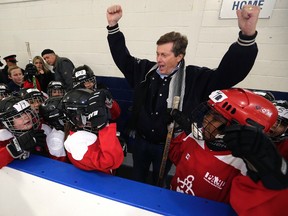 Mayor  John Tory cheers on the players on the Jumpstart team at the Angela James Arena  on Sunday.  (CRAIG ROBERTSON, Toronto Sun)