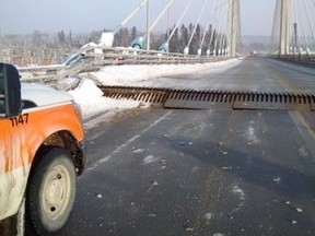 The Ontario Provincial Police posted this photo on Twitter on the damaged Nipigon River Bridge on Sunday, Jan. 10, 2016.