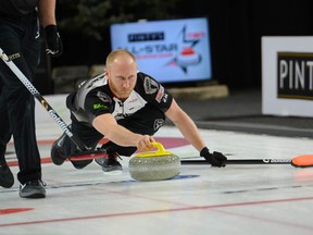 Skip Brad Jacobs of Team Jacobs shoots the rock during the men's final of the 2016 Pinty's All-Star Curling Skins Game at the Fenlands Recreation Centre in Banff, Alta., on Jan. 10, 2016. (Daniel Katz/Crag & Canyon/Postmedia Network)