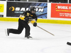 Corrin Lostell (77) of the Mitchell U16A ringette team takes a shot during recent action against Cambridge. The Stingers won five of their six games to win the gold medal of the Whitby tournament this past weekend. ANDY BADER/MITCHELL ADVOCATE