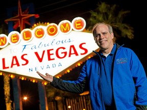 Jon Killoran, head of the committee producing the 2016 World Financial Group Continental Cup and the March 2018 Men’s World Curling Championship stands in front of  the famous Las Vegas, Nevada sign. Chris Holloman Photography