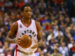 DeMar DeRozan of the Toronto Raptors runs the ball against the Dallas Mavericks during NBA action at the Air Canada Centre in Toronto on Dec. 22, 2015. (Dave Abel/Toronto Sun/Postmedia Network)