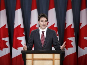 Canada's Prime Minister Justin Trudeau speaks during a news conference in Ottawa on December 9, 2015. The thought of a referendum on electoral reform has split Canadians along party lines. REUTERS/Chris Wattie