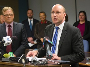 Mayor Matt Brown with city treasurer Martin Hayward, and the council behind them, talk about their  first 4-year budget they will be working on for the next two months at city hall. (MIKE HENSEN, The London Free Press)
