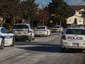 Peel Regional Police at the scene on Dursley Cr. in Mississauga Monday January 11, 2016 after responding to a break and enter in progress. (Ernest Doroszuk/Toronto Sun)