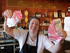Lisa Guluzian, owner of World Class Bakers, who is giving away Powerball tickets if you buy $20 worth of baking at her store, is seen Monday, January 11, 2016. (Craig Robertson/Toronto Sun)