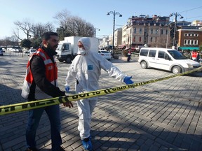 Emergency services attend the scene after an explosion near the Ottoman-era Sultanahmet mosque, known as the Blue mosque in Istanbul, Turkey, on Jan. 12, 2016. (REUTERS/Osman Orsal)