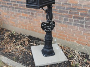 Submitted photo: In this box outside of St. James Anglican church will be hats, mittens and scarves for people to take to keep warm this winter. The box is the handiwork of the James Street Ministry.