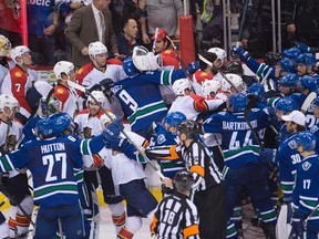 A bench clearing brawl breaks out following the Canucks overtime win over the Panthers in Vancouver on Monday, Jan. 11, 2016. (Jonathan Hayward/THE CANADIAN PRESS)