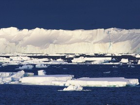 This undated handout photo received on March 17, 2015 from the Australian government's Antarctic Division shows a view of the Totten Glacier, the most rapidly thinning glacier in East Antarctica. AFP PHOTO / AUSTRALIAN ANTARCTIC DIVISION