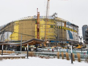 Workers work on Rogers Place in the Ice District in Edmonton, Alta., on Friday January 8, 2016. Ian Kucerak/Edmonton Sun/Postmedia Network