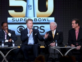 James Brown (left), host of The Super Bowl Sunday, Phil Simms (2nd left), analyst for Super Bowl 50 on CBS Sports, Jack Whitaker, play-by-play announcer for Super Bowl 1, and Jim Nantz (right), play-by-play announcer for Super Bowl 50, appear at the CBS Sports panel at the Television Critics Association (TCA) Winter Press Tour in Pasadena, Calif., January 12, 2016. (REUTERS/David McNew)