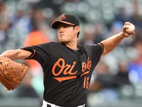 Wei-Yin Chen of the Baltimore Orioles pitches against the New York Yankees at Oriole Park at Camden Yards on October 3, 2015 in Baltimore. (Mitchell Layton/Getty Images/AFP)