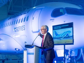 Federal Transport Minister Marc Garneau speaks to staff at Bombardier's CS100 plant Friday, December 18, 2015 in Mirabel, Que. THE CANADIAN PRESS/Ryan Remiorz