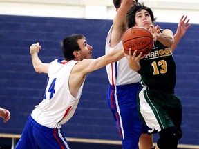 Nick Treadwell of the Sudbury Secondary North Stars tries to block the shot of Robert Dufresne of the Confederation Chargers during senior boys basketball in Sudbury, Ont. on Tuesday January 12, 2016.