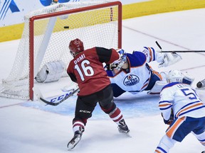 Coyotes forward Max Domi scores his first goal of the night on Oilers goalie Anders Nilsson during the second period of Tuesday's game in Glendale, Ariz. (USA TODAY SPORTS)
