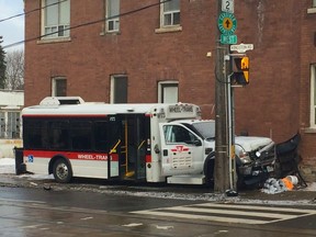A Wheel-Trans bus ran down a man and his two dogs on a sidewalk along Kingston Rd. at Main St. Wednesday morning. (Chris Doucette/Toronto Sun)