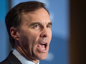 Finance Minister Bill Morneau delivers a speech, Tuesday, Jan. 12, 2016 in Montreal. THE CANADIAN PRESS/Paul Chiasson