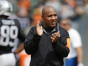 The Browns are set to hire Bengals offensive coordinator Hue Jackson as their next head coach. (Ben Margot/AP Photo/Files)
