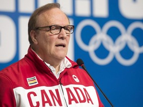 Canadian Olympic Committee President Marcel Aubut speaks during a news conference at the Sochi Winter Olympics on February 6, 2014 in Sochi, Russia. (THE CANADIAN PRESS/Adrian Wyld)