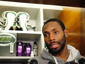 New York Jets cornerback Antonio Cromartie speaks to reporters in front of his locker at the team's NFL football training facility Wednesday, Dec. 30, 2015, in Florham Park, N.J.   (AP Photo/Kathy Willens)