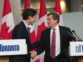 Prime Minister Justin Trudeau at Toronto City Hall press conference with Toronto Mayor John Tory on Wednesday January 13, 2016. Stan Behal/Toronto Sun/Postmedia Network