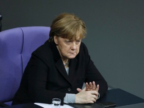 German Chancellor Angela Merkel attends the debate at the German parliament Bundestag on the crime in Cologne during New Year's Eve, in Berlin Wednesday, Jan. 13, 2016. (AP Photo/Markus Schreiber)