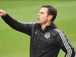 Toronto FC head coach Greg Vanney watches game action during second half of Toronto's 3-1 win over Colorado Rapids at BMO Field. (Dan Hamilton-USA TODAY Sports)