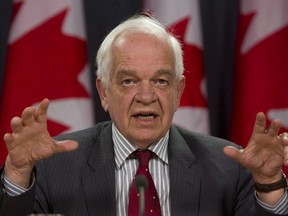 Immigration Minister John McCallum holds a news conference to update the Syrian refugee situation, in Ottawa, Wednesday, December 23, 2015. (THE CANADIAN PRESS/Fred Chartrand)