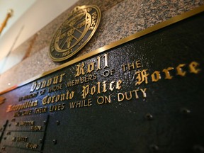 The Honour Roll for those who have lost their lives with the Toronto Police at headquarters in Toronto on Wednesday, January 13, 2016. (Dave Abel/Toronto Sun)