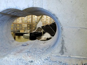 The hole that robbers drilled through the concrete vault during the Hatton Garden heist in London, Britain. is seen in this undated handout photo released to Reuters by the Metropolitan Police on Jan. 14, 2016.  REUTERS/Metropolitan Police/Handout