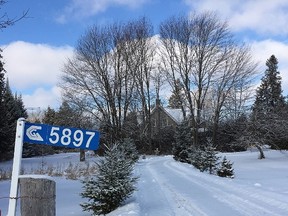 A century-old residence at 5897 Fernbank Rd. is the subject of a heritage application, but family members are angry that the City of Ottawa keeps interfering with their property. (Errol McGihon Ottawa Sun / Postmedia Network)