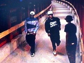 From left, Christian Kadima, Warsama Youssouf and Hanten Hersi are shown in this still from Aug. 11, 2013 surveillance video of the Blair Transitway station, which was entered into evidence at their trial. The three men, and Maher Fafayi, are accused of accosting and then sexually assaulting a 15-year-old girl. (Handout)