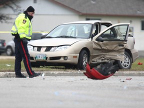 A 2010 file photo shows a crash at Bishop Grandin Boulevard and St Mary's Road.