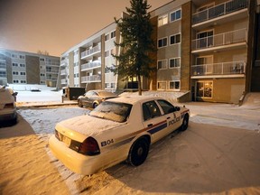 Edmonton Police Service vehilce sits outside an apartment neat 119 Ave., and 34 St., in Edmonton on Thursday Jan.  14, 2016. EPS is investigating a suspicious death in the area of 119 Avenue and 34 Street that was reported around 730 p.m. tonight. As it is very early into the investigation, no further information is available at this time.
