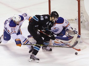 Shraks forward Tomas Hertl is stopped by Oilers goalie Cam Talbot during first-period action Thursday at the SAP Center in San Jose. (AP Photo)