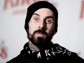 Travis Barker attends Countdown to Christmas and Snoopy's Merriest Tree Lighting Event at Knott's Berry Farm on Saturday, Dec. 5, 2015, in Buena Park, Calif. (Photo by Richard Shotwell/Invision/AP)