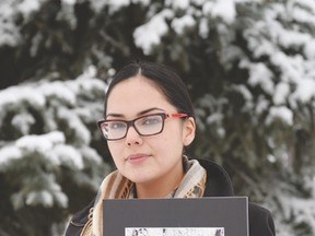 Larissa Papin holds a photo of her cousin Georgina Papin, whose remains were found buried at Robert Pickton’s Port Coquitlam, B.C. pig farm - Marcia Love