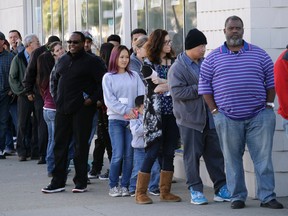 People line up for the Powerball lottery.
