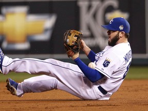 Kansas City Royals third baseman Mike Moustakas and outfielder Lorenzo Cain are the team’s only unsigned arbitration-eligible players. (AP Photo/Matt Slocum)
