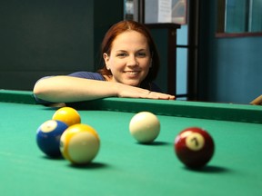 John Lappa/Sudbury Star
Alyssa Short, of the OSPCA Sudbury and District Animal Centre, lines up a shot on Friday. A 9-ball pool tournament is being held on Saturday 6:30 p.m at Rhythm 'N Cues on Lasalle Boulevard as part of a fundraiser for the local OSPCA.