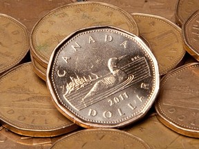 Canadian dollars are pictured in Vancouver, Sept. 22, 2011.